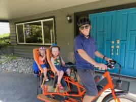 Jordan Back and his family on a bike